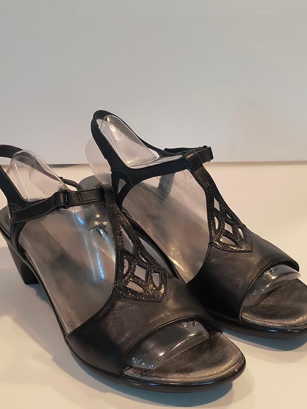 NAOT Wmn's 40/9 Black Leather Geometric Cut Out T-Strap Low Wedge Sandals